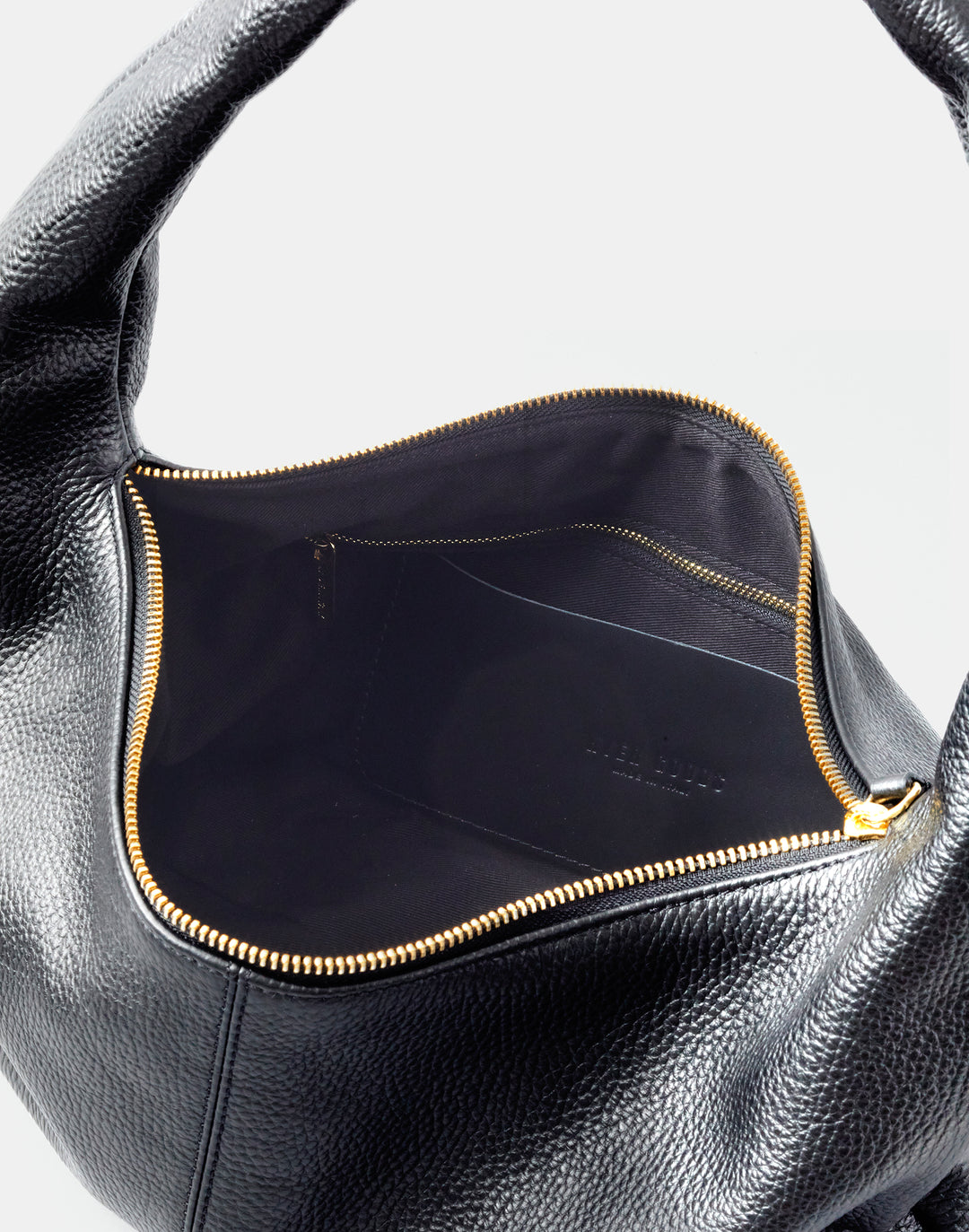 HYER GOODS slouchy everyday shoulder bag #color_black-gold