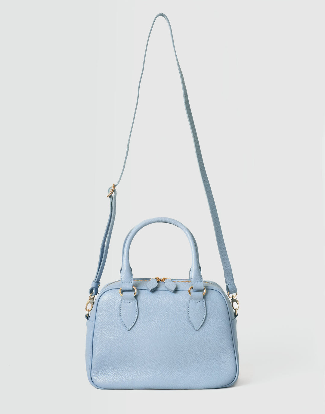 hyer goods la corsa pale blue leather bowling bag with crossbody strap front view #color_pale-blue