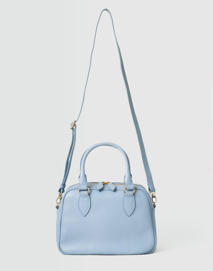hyer goods la corsa pale blue leather bowling bag with crossbody strap front view #color_pale-blue