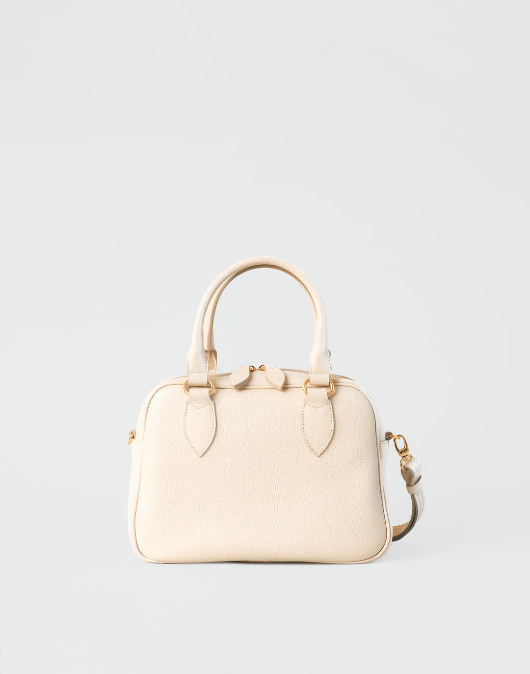 hyer goods la corsa off-white leather bowling bag with crossbody strap front bone with gold hardware #color_bone