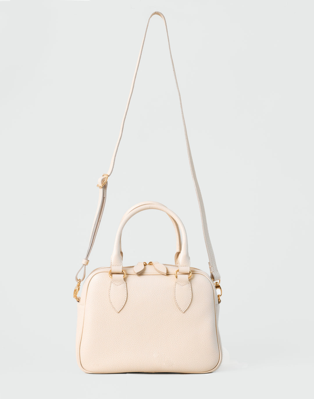 hyer goods la corsa off-white leather bowling bag with crossbody strap bone with gold hardware front #color_bone