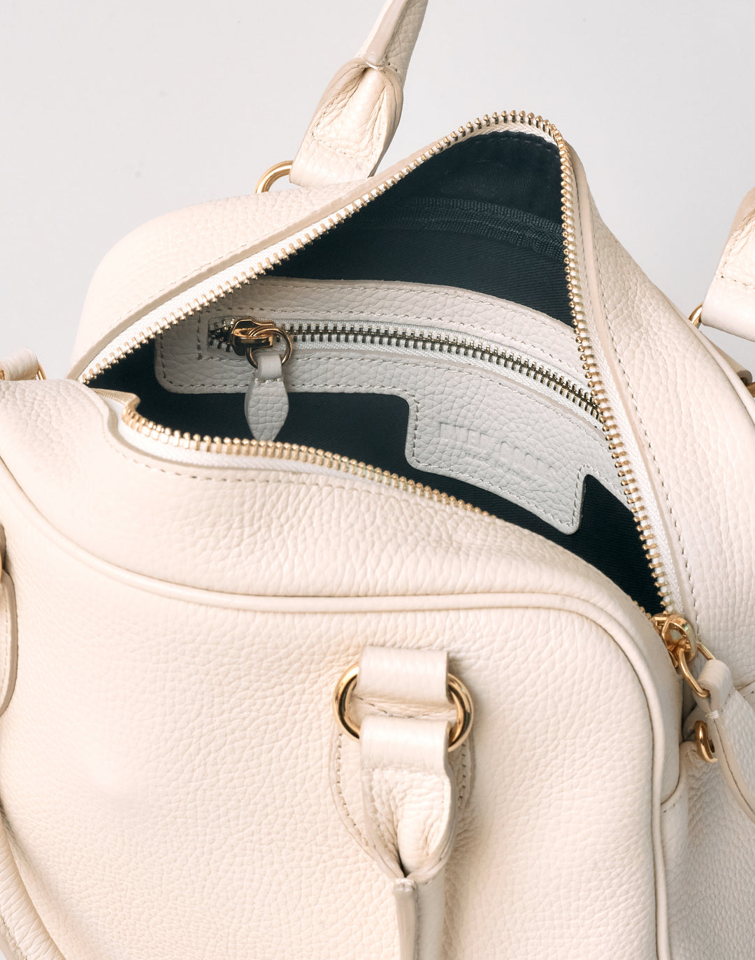hyer goods la corsa off-white leather bowling bag inside pocket view bone with gold hardware #color_bone