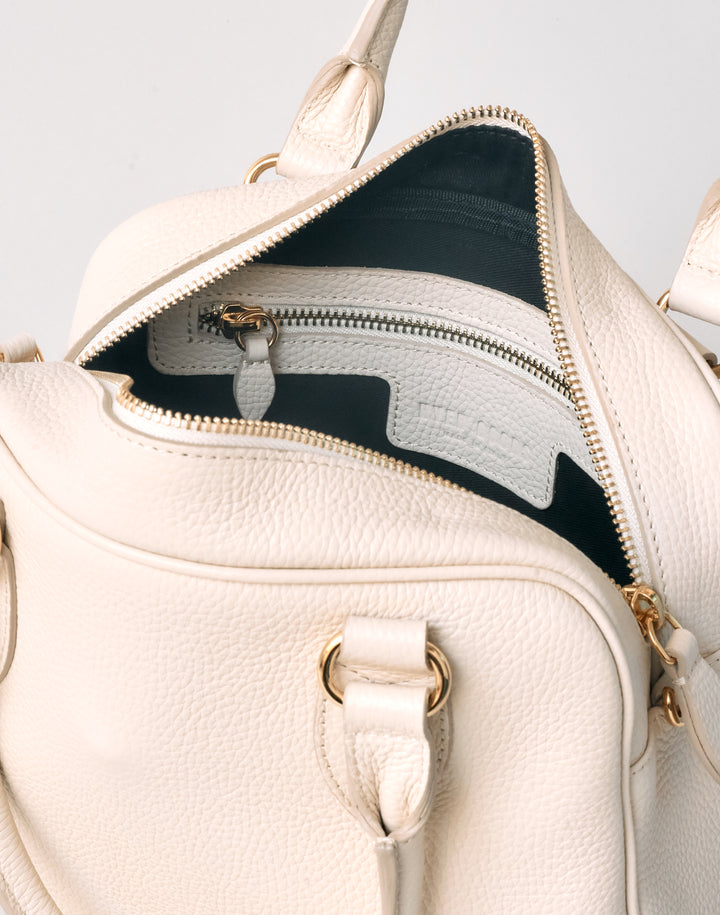 hyer goods la corsa off-white leather bowling bag inside pocket view bone with gold hardware #color_bone