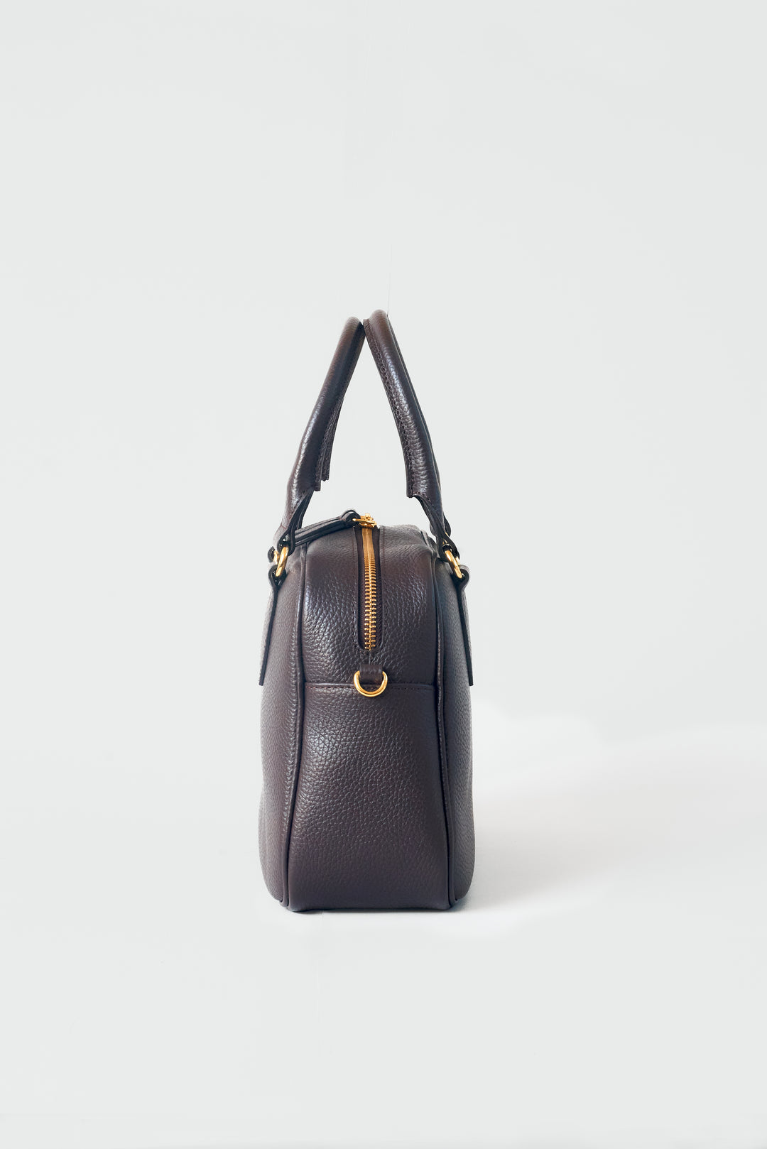hyer goods la corsa dark brown leather bowling bag side view #color_dark-chocolate