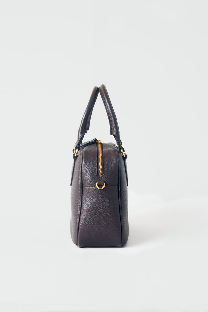 hyer goods la corsa dark brown leather bowling bag side view #color_dark-chocolate