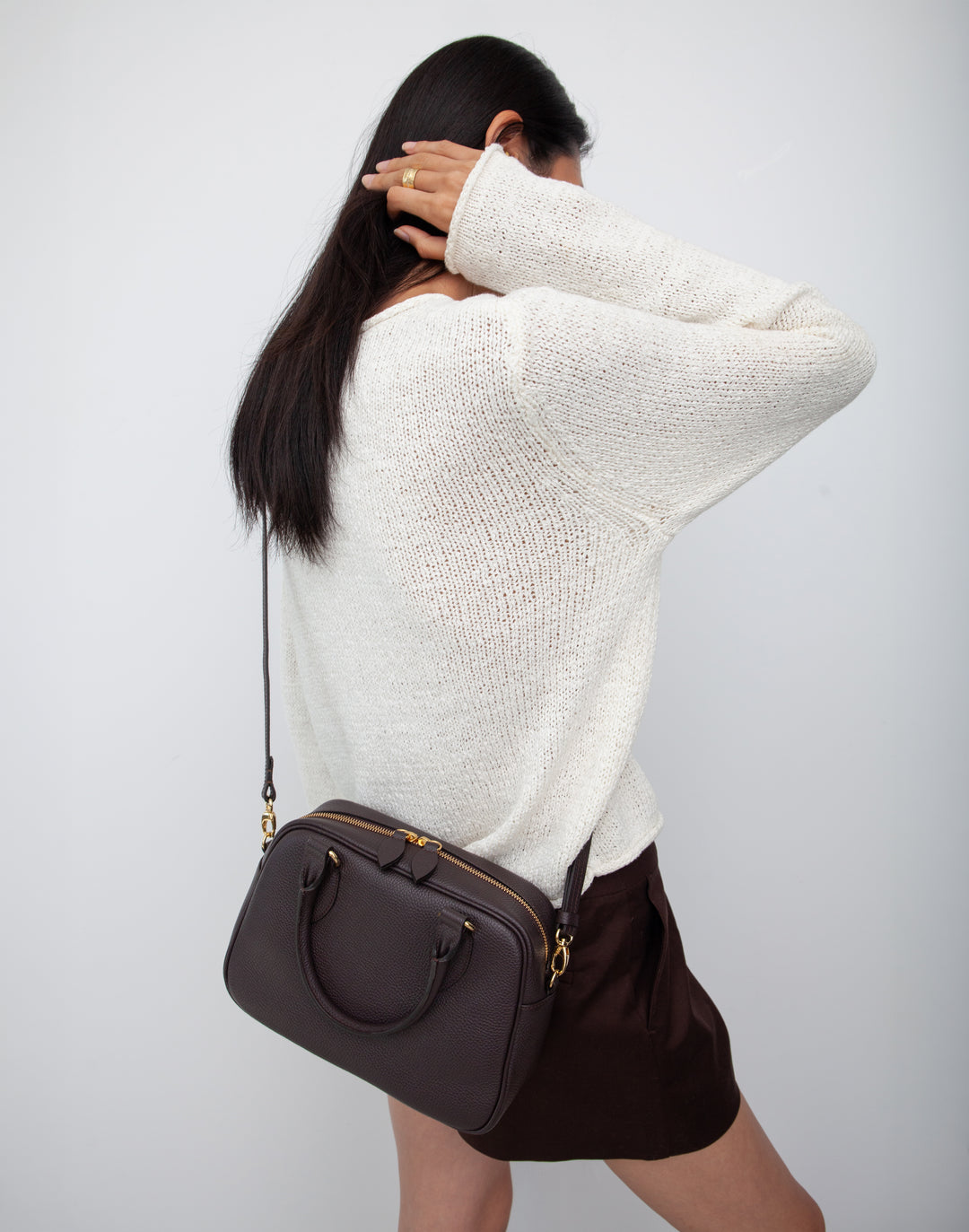 hyer goods la corsa dark brown leather bowling bag front view dark chocolate with gold hardware worn as a crossbody doctor bag #color_dark-chocolate