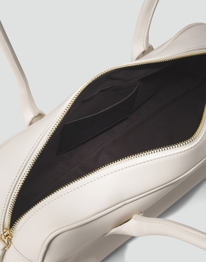 HYER GOODS La Strada East West Bag in off-white #color_off-white