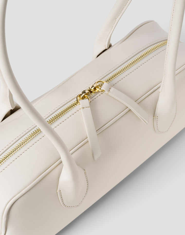 HYER GOODS La Strada East West Bag in off-white #color_off-white