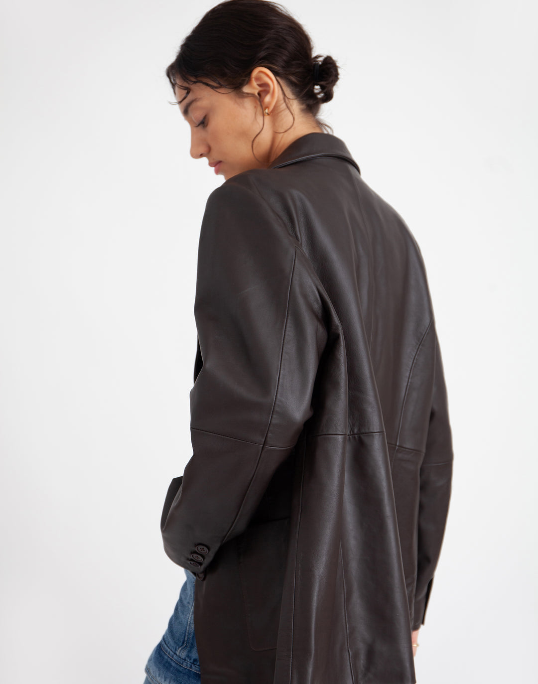 Sustainable leather blazer with relaxed fit in black #color_chocolate