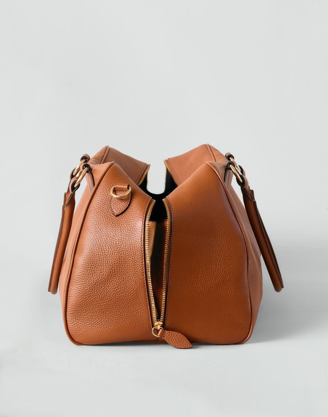 HYER GOODS tan leather la via weekender duffel bag side view #color_cognac
