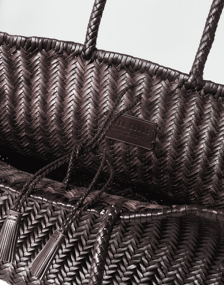hyer goods tan woven leather oversized mercato summer tote bag inside view with tassle closure #color_dark-chocolate