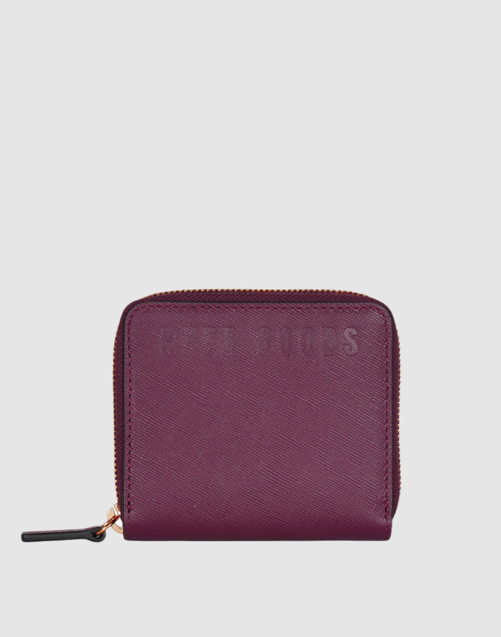 a burgundy leather zip wallet with the logo HYER GOODS embossed on it.#color_wine-saffiano