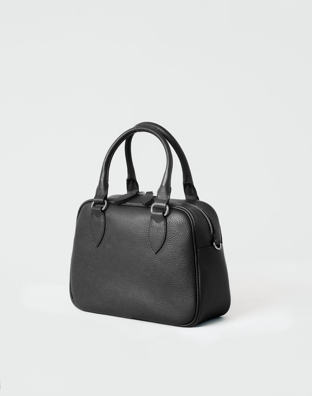 hyer goods la corsa black leather bowling bag 3/4 view black with silver hardware #color_black