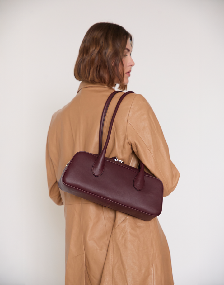 HYER GOODS La Strada East West Bag in burgundy wine #color_burgundy